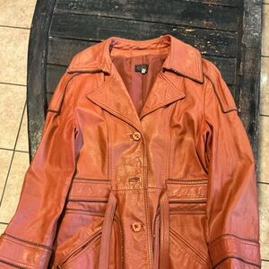 Women's Orange Leather Coat it is missing two buttons great nice vintage